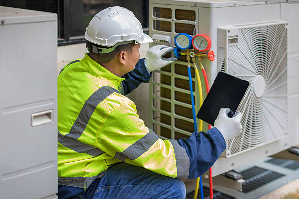 Professional Hvac technician working in Jensen Beach, FL